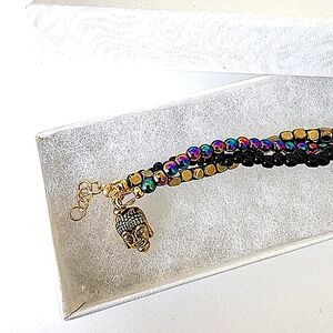 Hematite Buddha charm braided bracelet